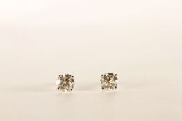 Pair of Diamond Solitaire Earrings, total approximate Diamond weight 1.45 ct, 4 claw set, stamped