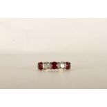 Ruby and Diamond 5 Stone Ring, set with 3 round cut rubies and 2 round brilliant cut diamonds,