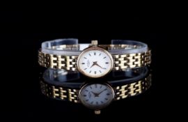 LADIES ROTARY WRISTWATCH, oval white dial with applied gold hour markers and dauphine hands, 18mm