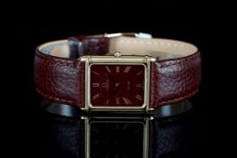 MID SIZE OMEGA DE VILLE WRISTWATCH, rectangular maroon dial with gold roman numerals and hands,