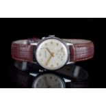 GENTLEMENS MOVADO WRISTWATCH, circular patina dial with applied Arabic numerals and hands,