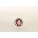Victorian-style Platinum Ruby and Diamond Ring, set with 4 diamonds centrally surrounded by