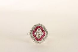 Victorian-style Platinum Ruby and Diamond Ring, set with 4 diamonds centrally surrounded by