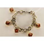 ***TO BE SOLD WITHOUT RESERVE - EX SHOP STOCK***Charm Bracelet, set with 5 orange stones, stamped