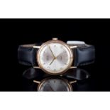 GENTLEMENS VERTEX REVUE 9CT GOLD WRISTWATCH, circular silver dial with applied hour markers and