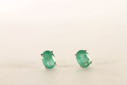 Pair of Emerald Stud Earrings, 4 claw set, stamped sterling silver, butterfly backs, comes with a