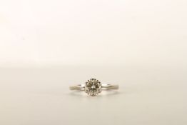 Diamond Solitaire Ring, set with a single round brilliant cut diamond, 6 claw set, stamped 18ct