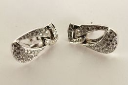 Pair of Diamond Clip Earrings, each set with round brilliant cut diamonds, clip on backs,