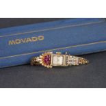 LADIES MOVADO 14CT GOLD DIAMOND & RUBY SET COCKTAIL WATCH W/ BOX, square patina dial with applied
