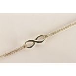 Tiffany & Co Infinity Bracelet, stamped sterling silver, approximate length 14.5cm, comes with a