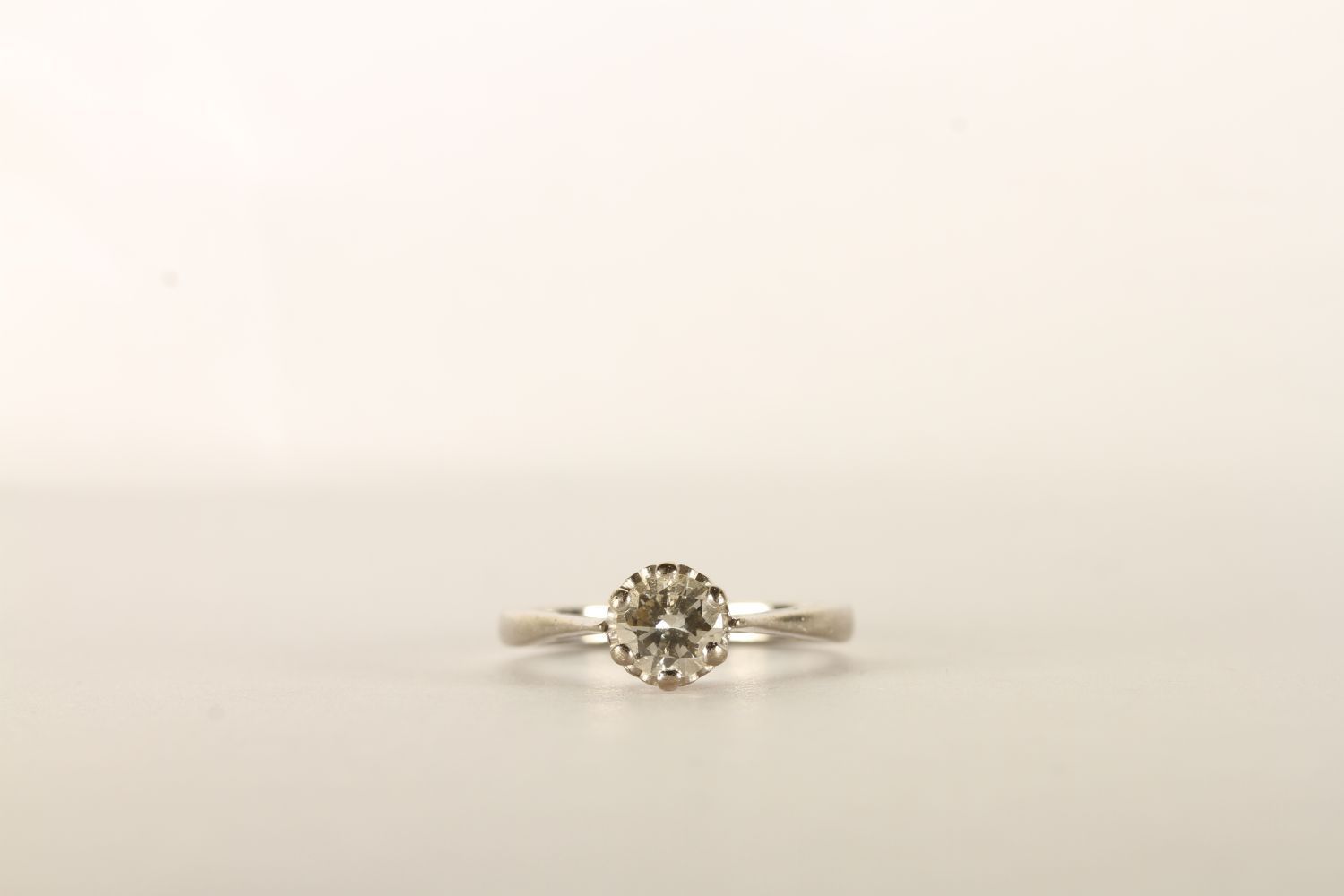 Diamond Solitaire Ring, set with a single round brilliant cut diamond, 6 claw set, stamped 18ct