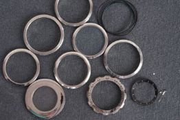 GROUP OF ASSORTED BEZELS, group of 10 bezels including mondia and possibly omega, seals, black inner