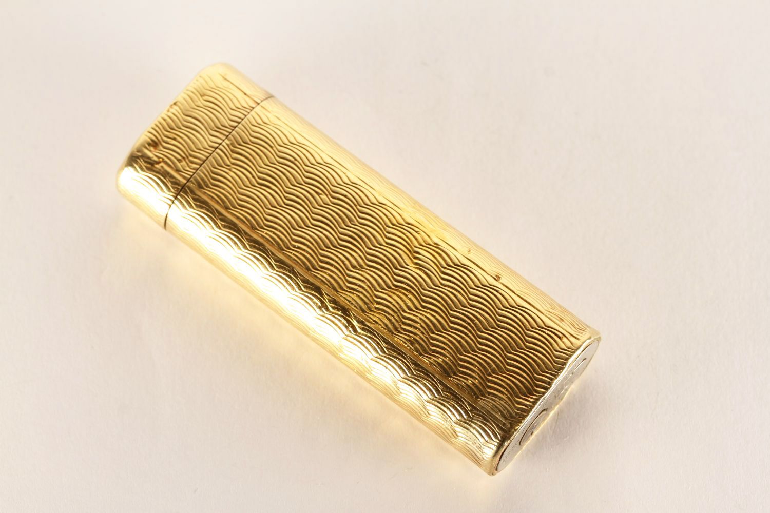 Cartier Lighter, gold patterned design, approximate length 7cm