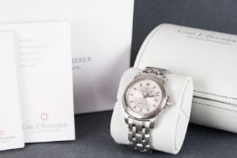 GENTLEMENS CARL F BUCHERER AUTOMATIC DATE WRISTWATCH W/ BOX & SPARE LINKS, circular silver dial with