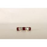 Ruby and Diamond 5 Stone Ring, set with 3 round cut rubies and 2 round brilliant cut diamonds,