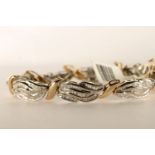 Diamond Bracelet, set with rows of baguette cut diamonds, total approximate length 19.5cm, please