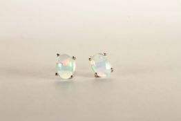 Pair of Ethiopian Opal Stud Earrings, each set with an oval cut ethiopian opal, 4 claw set,