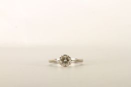 Diamond Solitaire Ring, set with a single round brilliant cut diamond, 6 claw set, stamped 18ct