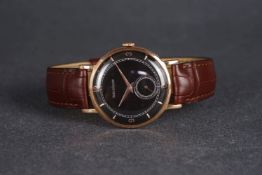 VINTAGE 18CT ROSE GOLD JAEGER-LECOULTRE, circular black dial with rose gold baton and Arabic