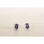 Pair of Tanzanite Stud Earrings, each set with an oval cut tanzanite, 4 claw set, stamped sterling