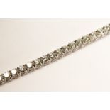 Diamond Tennis Bracelet, set with round brilliant cut diamonds totalling approximately 15.10ct, 4