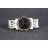 GUCCI DRESS WATCH REF 5200 M.1, circular black dial, Roman numerals, stainless steel case and