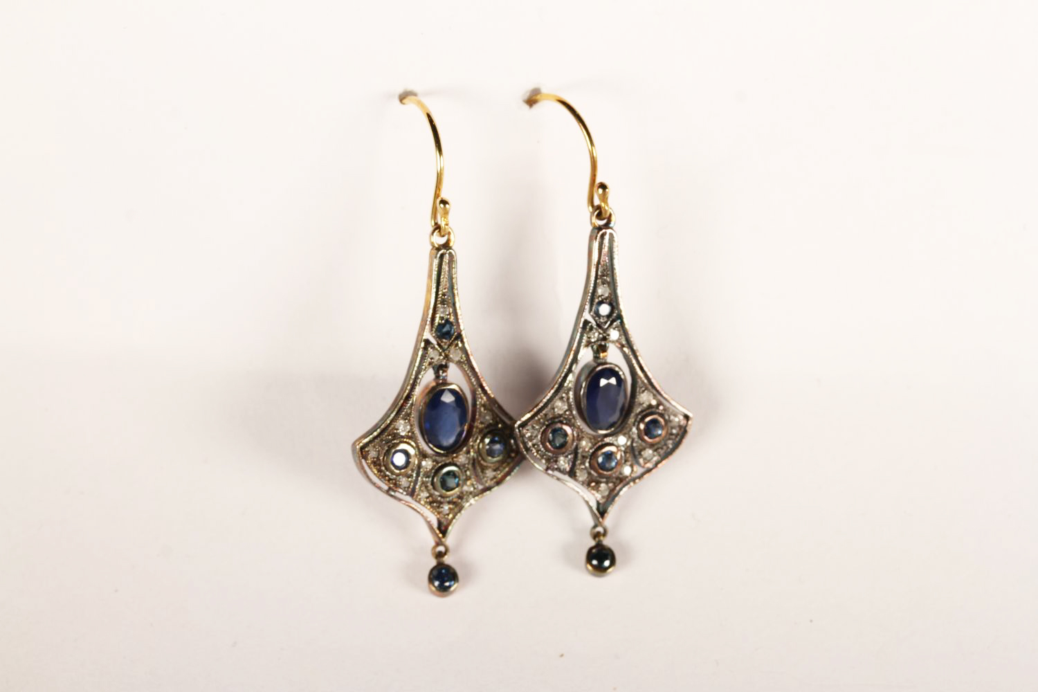 Pair of Sapphire and Diamond Flared-Design Drop Earrings, set with sapphires and diamonds, fish hook