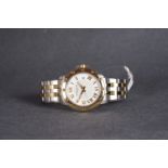 GENTLEMENS RAYMOND WEIL DATE WRISTWATCH, circular two tone dial with gold roman numerals and