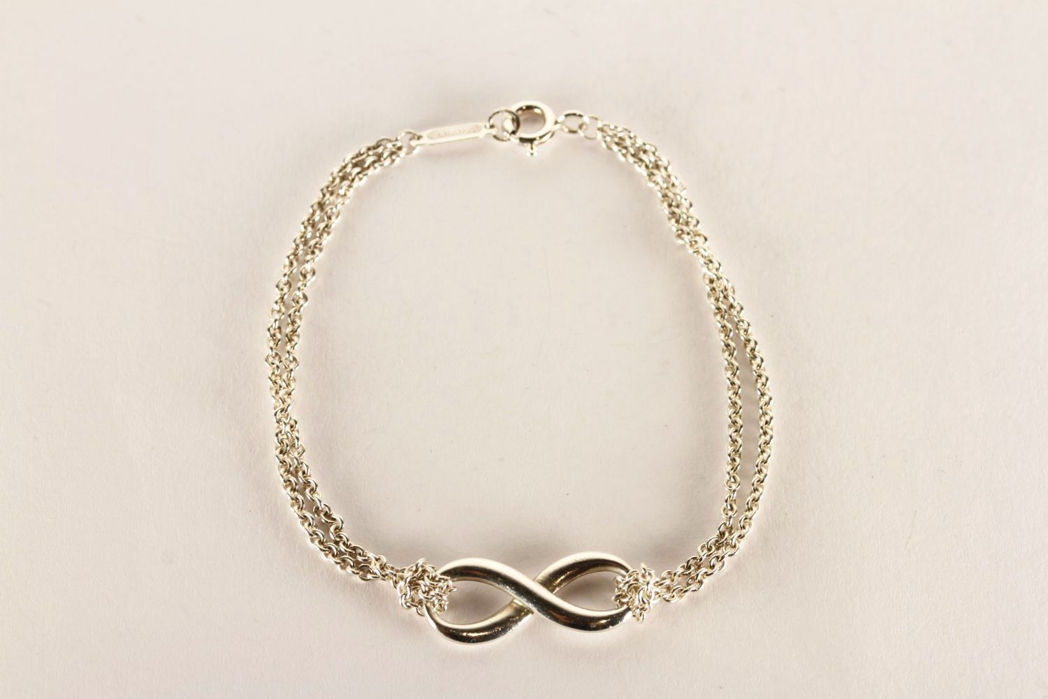 Tiffany & Co Infinity Bracelet, stamped sterling silver, approximate length 14.5cm, comes with a - Image 2 of 3