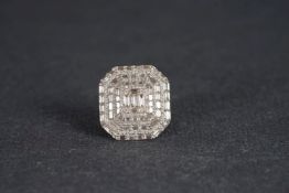 Diamond cocktail ring, tiered panel ring set with baguette and brilliant cut diamonds, estimated