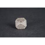 Diamond cocktail ring, tiered panel ring set with baguette and brilliant cut diamonds, estimated