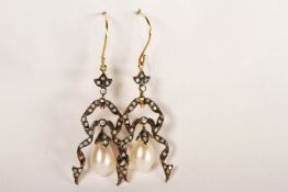 Pair of Ribbon-Style Drop Earrings, set with diamonds and 2 pearls, fish hook backs, comes with a