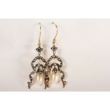 Pair of Ribbon-Style Drop Earrings, set with diamonds and 2 pearls, fish hook backs, comes with a