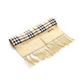 Burberry Haymarket Check Silk Scarf, this scarf features a print on 100% silk with tassel details.