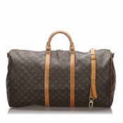 Louis Vuitton Monogram Keepall Bandouliere 60, the Keepall Bandouliere 60 features the Monogram