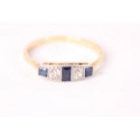 Early 20th C Sapphire and Diamond ring, three square cut sapphires, diamond spacers, in 18ct and