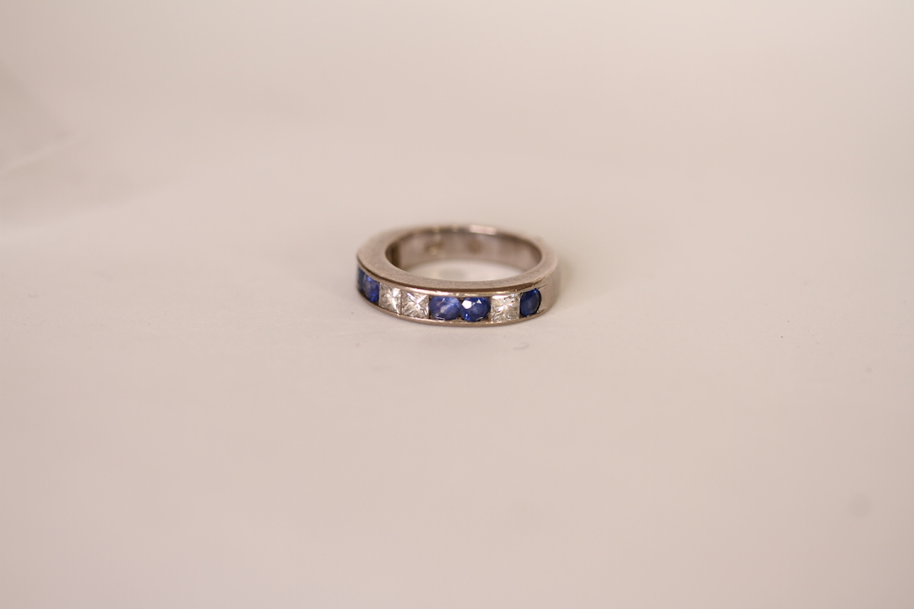Sapphire and diamond half eternity ring, six round cut blue sapphires, four princess cut diamonds,
