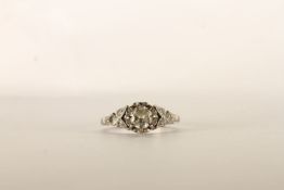 Diamond Ring, centre set with a round brilliant cut diamond, 8 claw set, diamond set shoulders,