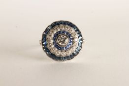 Sapphire and Diamond Ring, centre set with a diamond, surrounded by calibre cut sapphires and