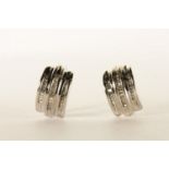 Pair of Diamond Huggie Earrings, each set with 3 rows of baguette cut diamonds, stamped 14ct white