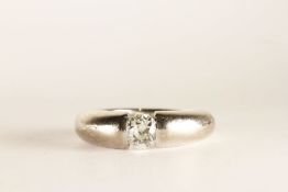 0.68ct Diamond Solitaire Ring, set with a single tension set diamond,heavy band 4.4mm wide,