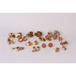 13 Pairs of 9ct earrings including, knots, pear set drops and hoops, most with butterfly backs 38g