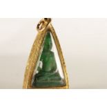 Carved Emerald Buddha Pendant, carved 'emerald' buddha set inside a triangle shaped gold pendant
