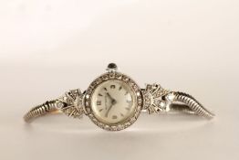 LADIES VINTAGE STYLE MOVADO WRISTWATCH, circular silver dial with hour markers and arabic numbers,