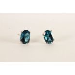 Pair of London Blue Topaz Stud Earrings, each set with an oval cut London blue topaz, 4 claw set,