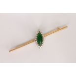 Jade and diamond bar brooch, marquise cabochon of Jade 17.2x7.3mm, a cluster of round cut