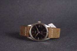 GENTLEMENS ROLEX OYSTER PRECISION OVERSIZE WRISTWATCH REF. 6424, circular black gloss gilt dial with