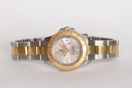 LADIES ROLEX OYSTER PERPETUAL YACHT-MASTER REFERENCE 69623, circular silvered dial, luminous hour