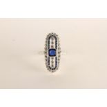Sapphire and Diamond Ring, centre set with a cushion-shaped sapphire, flanked vertically by 3