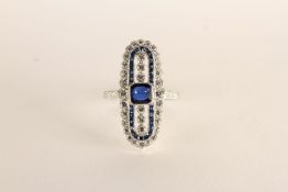 Sapphire and Diamond Ring, centre set with a cushion-shaped sapphire, flanked vertically by 3